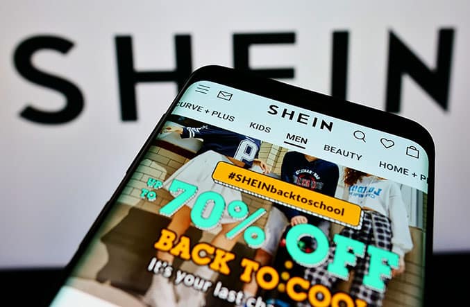 A cellphone with the Shein app displayed on it.